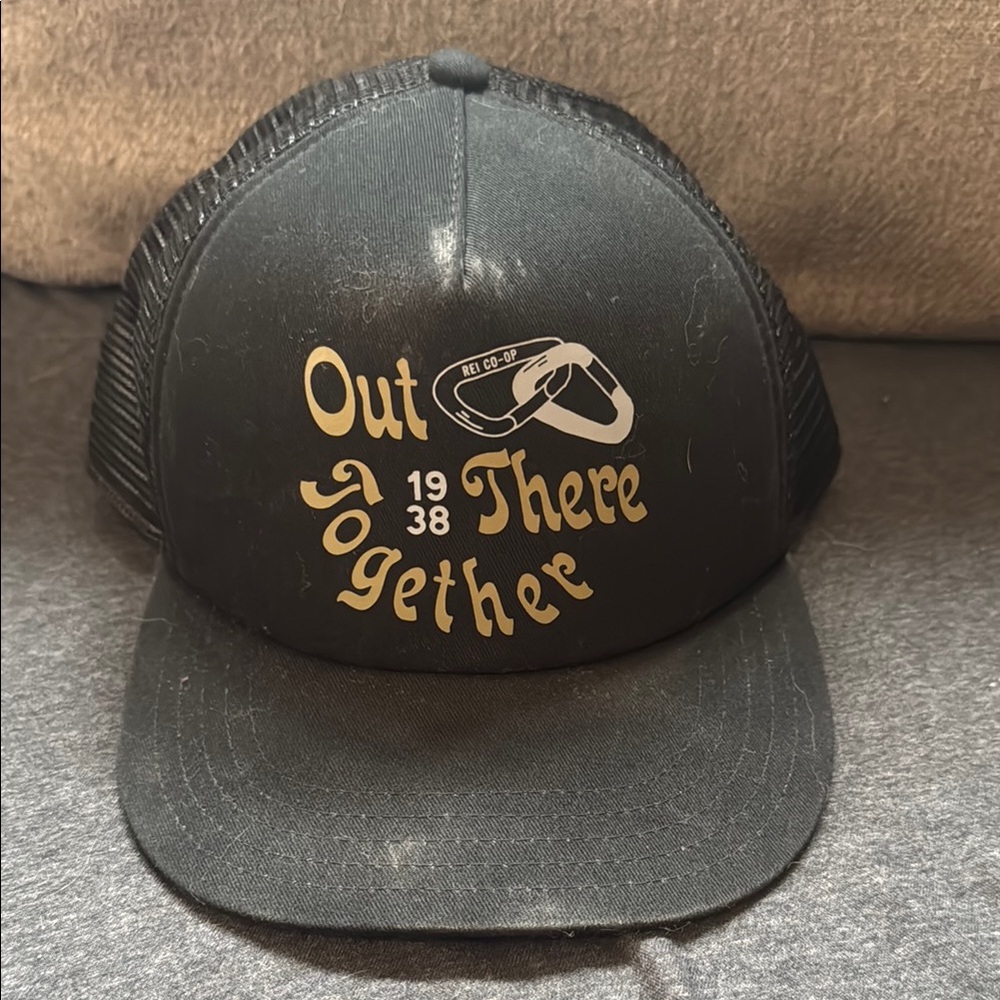REI Black Trucker Hat with Gold Print